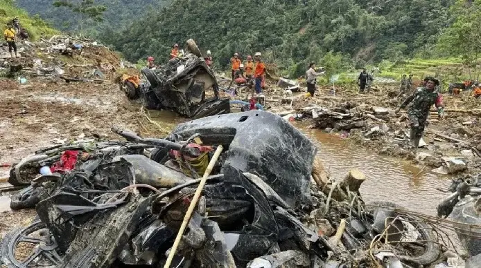 Landslides kill 7, leave dozens missing, bury entire village