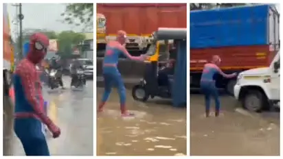 മഴയിൽ മുങ്ങിയ നഗരത്തിന് കാവലായി ‘സ്പൈഡർമാൻ’; യാത്രക്കാരെ രക്ഷിച്ച് യുവാവിന്റെ വേറിട്ട പ്രതിഷേധം